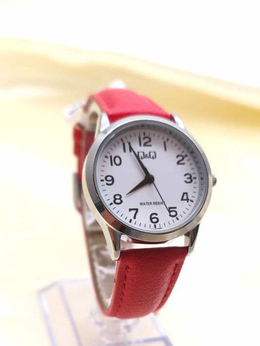 RELOJ QYQ CUERO