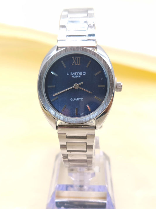 RELOJ LIMITED PLATEADO