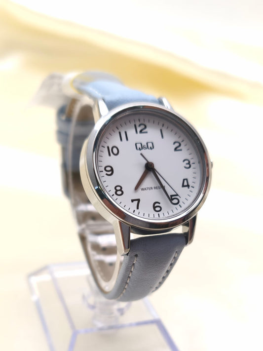 RELOJ QYQ CUERO