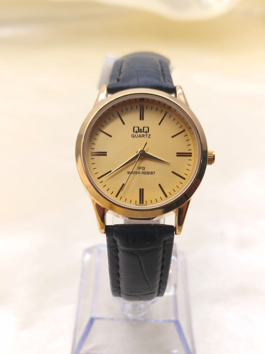 RELOJ QYQ CUERO